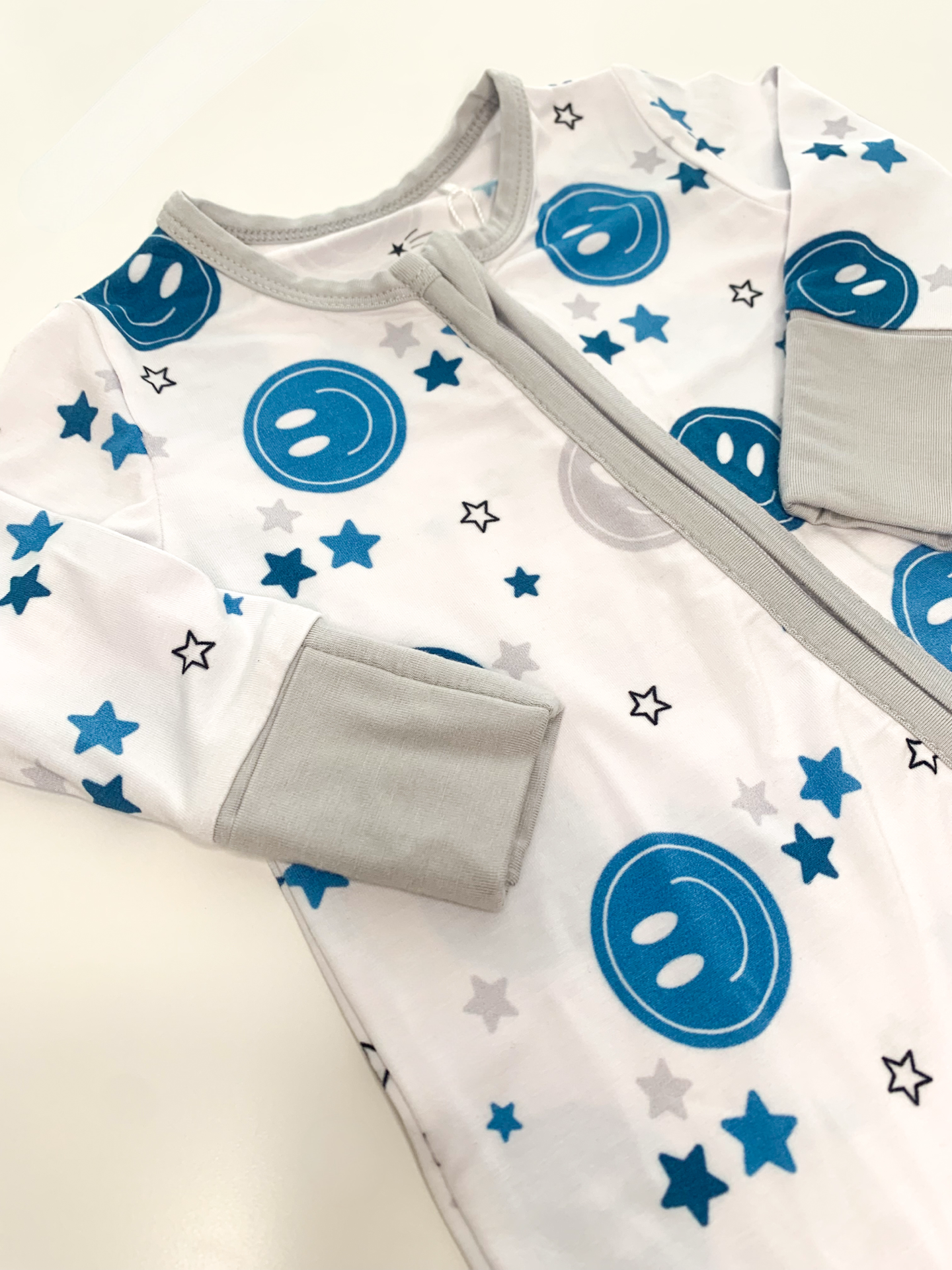 Blue Smiley Coverall