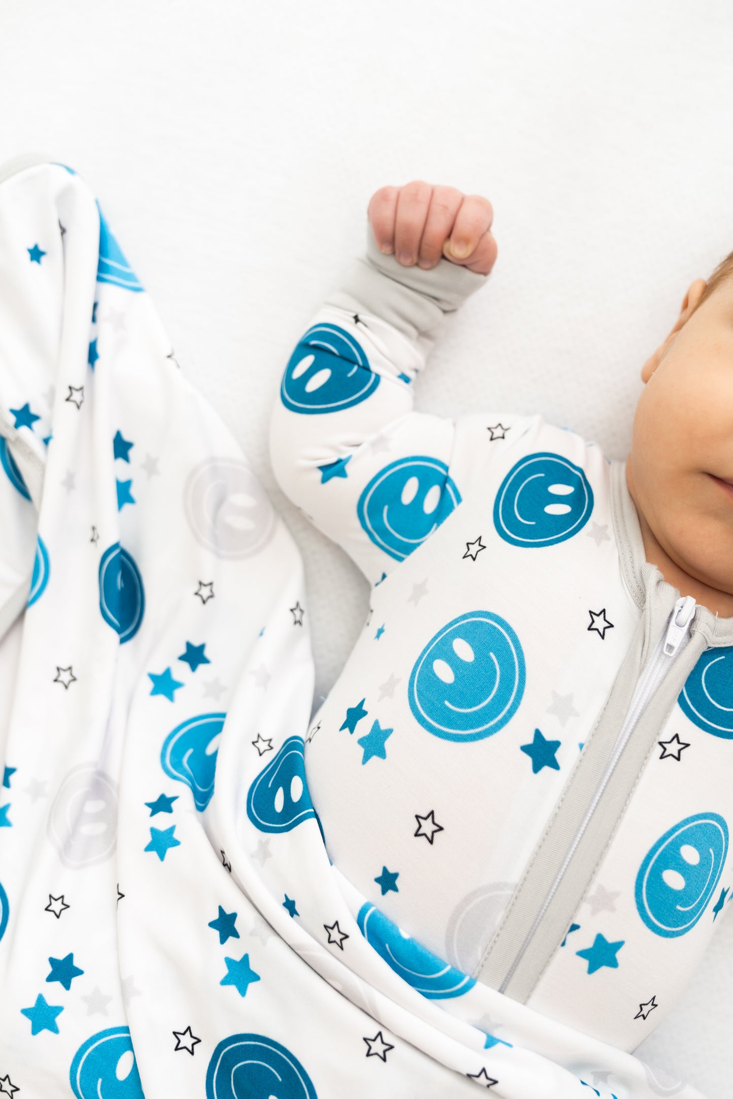 Blue Smiley Coverall